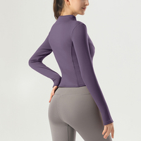 Veste de yoga zippée doublée polaire la plus vendue pour femme – Haut de sport ajusté pour la course et l'entraînement avec doublure thermique et trous pour les pouces