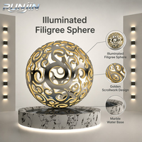 Sculpture sphérique ajourée découpée au laser en acier inoxydable miroir, motif géométrique en treillis, anneau forgé à la main moderne, art métallique Orbit Ring pour Plaza et Hôtel