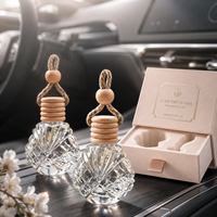 Diffuseur de parfum pour voiture en verre facetté en forme de coquillage, réutilisable, 14 ml, avec bouchon en bois naturel et corde.