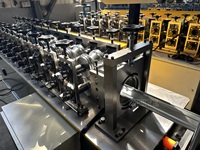 Machine de formage de rouleaux pour portes de garage à volets roulants en acier galvanisé, commande PLC, coupeur hydraulique, moteur à engrenages et roulements
