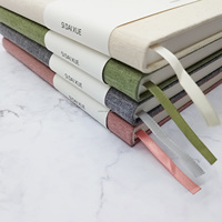 Carnet à couverture rigide en tissu de lin de qualité supérieure, impression personnalisée, journal recouvert de tissu avec bande de maintien en papier – Vente en gros
