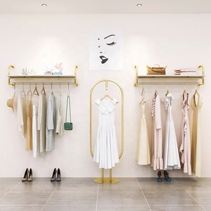 Moda <span class=keywords><strong>Pretty</strong></span> Golden Garment Stand Montado en la pared Mujer Ropa Estante de exhibición para <span class=keywords><strong>tienda</strong></span> Boutique - Product Image 2