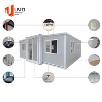 Maison en conteneur extensible de luxe de 20 pieds/40 pieds Maison mobile modulaire préfabriquée Salle de bain complète pour les centres de villégiature solaires Hôpitaux Panneau sandwich