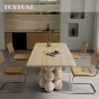 Table à manger en marbre travertin naturel super blanc Tostone Designer, base en pierre multi-sphérique pour la décoration de la salle à manger à domicile