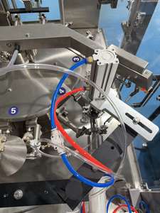 Автоматическая роторная машина для розлива томатной пасты и соков в готовые пакеты дой-пак с дозатором и зип-локом - Product Image 3