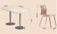 Table de restaurant pliable en bois avec structure en acier robuste et chaises en contreplaqué