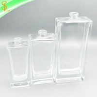 Bouteille de parfum vide transparente Rectangle portable vide 30 ml 50 ml 100 ml 3.4oz Bouteilles d'atomiseur de parfum en verre avec couvercles personnalisés