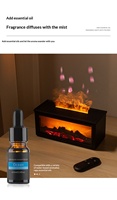 Diffuseur d'arômes Flamme de Cheminée, Mini Humidificateur d'Ambiance de Bureau à Sept Couleurs avec Effet Flamme Simulé et Goutte d'Huile Essentielle pour la Maison