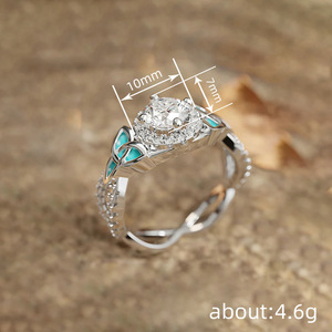 T0889 Anello di Fidanzamento da Donna in Argento 925 con Diamante Rotondo Brillante e Incastonatura a Griffe con Accenti in Turchese, Gioielleria Fine - Product Image 4