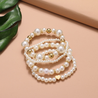 Mode amour coeur perle Bracelet 4 pièces ensemble Stretch bracelets porte-bonheur pour les femmes été bord de mer bijoux