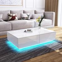 Table basse centrale simple à finition brillante avec 4 tiroirs et lumière LED pour le salon