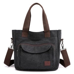 Sacs fourre-tout ajustables à bandoulière avec broderie – Imperméables et portables, fermeture éclair sécurisée, sangle confortable pour une utilisation nomade - Product Image 2