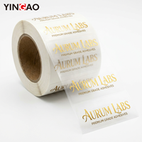 Étiquettes transparentes personnalisées en rouleau avec estampage à chaud en feuille d'or, résistantes aux UV, impression couleur pleine, autocollant de luxe avec logo