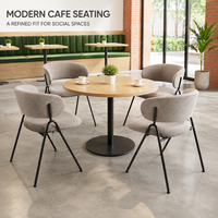 Chaise de salle à manger beige en bouclette, dossier semi-circulaire incurvé, accoudoirs intégrés, pieds sphériques, structure noire