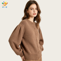 AJB OEM/ODM Cardigan pour femme de haute qualité, en coton pur tricoté, à manches lanternes, col rond, avec franges, coupe ample, pour l'hiver