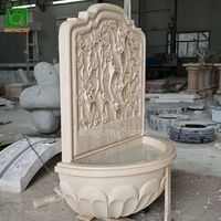 Fontaine murale en marbre naturel chinois sculptée en forme de tête de lion