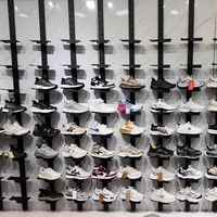 Magasin spécialisé de centre commercial combiner librement bande murale suspendue hauteur réglable Sneaker loisirs chaussure présentoir