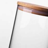 Un ensemble de bocaux de rangement en verre pour la cuisine à domicile avec couvercle en bambou scellé pour les épices R888