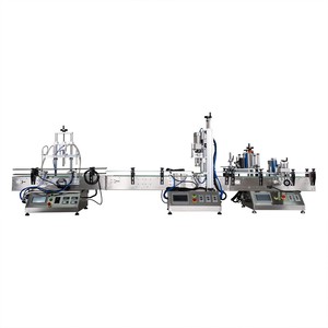 Ligne de machines automatiques de remplissage, de bouchage et d'étiquetage pour bouteilles rondes de whisky, de liqueur, de savon liquide et de produits de bureau. - Product Image 6