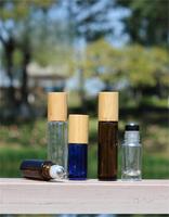 Chenlan diskon besar 5ml 10ml botol Roll-On kaca tutup bambu cetakan dapat disesuaikan minyak esensial botol parfum isi ulang kulit