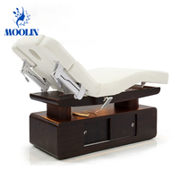 Table de massage moderne MOOLIN, professionnelle, esthétique, pour spa et institut de beauté, grand espace, électrique, chauffée, réglable en hauteur.