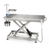Table d'opération vétérinaire XY ACS02 avec réglage électrique de la hauteur, surface en acier inoxydable et structure de support stable
