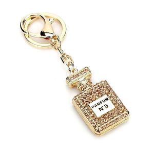 Porte-clés de luxe en alliage métallique avec pendentif en cristal brillant, boussole émaillée personnalisée pour breloque de sac femme, idéal pour l'art et l'artisanat - Product Image 2