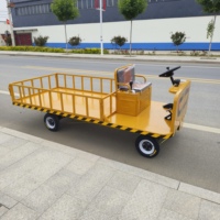 Chariot à plateau motorisé industriel avec clôture, commande au volant, camion électrique de transport de marchandises pour entrepôt, usine, logistique