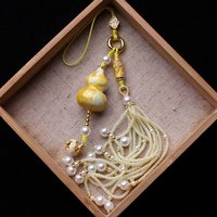 Pendentif artisanal unique fait main de style oriental en forme de gourde, avec perles et pompons, amulette clochette pour sac, miroir de voiture, ornement suspendu, breloque