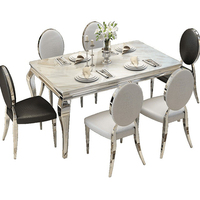 Ensemble de table à manger rectangulaire moderne de luxe en acier inoxydable doré avec plateau en marbre blanc pour 6 personnes