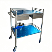 Chariot à instruments en acier inoxydable à 2 niveaux avec roues silencieuses pour usage hospitalier et clinique