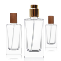 Bouteilles de parfum en verre rectangulaires de 50ml et 100ml du fabricant avec bouchon en bois Bouteilles en verre de qualité supérieure