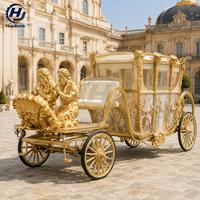 Calèche de mariage électrique royale avec décorations de figurines dorées jumelées pour hôtels, zones scéniques et services de transport événementiel