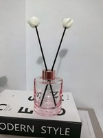 Bouteille en verre vide de qualité supérieure pour diffuseur de parfum à bâtonnets, avec marquage à chaud et surface gravée, logo personnalisé, MOQ flexible