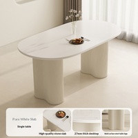 Ensemble table et chaises de salle à manger ovales en ardoise, style crème français, design minimaliste moderne pour petits appartements