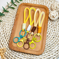 Porte-clés en maille fait main au design macaron coloré, cordon tressé simple pour téléphone, bouteille d'eau, pendentif, jouet, accessoire DIY
