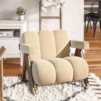 Fauteuil minimaliste moderne en tissu texturé gris avec base en bois géométrique noir pour chaises de salon