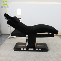 Lit de massage électrique haut de gamme avec design incurvé, éclairage LED, chauffage et modes de contrôle doubles pour salon de beauté et spa facial