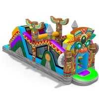 Structure gonflable 3-en-1 thème tribal primitif, avec parcours d'obstacles, toboggan et zone de saut, pour jeux de course et fêtes d'enfants, type parc d'attractions