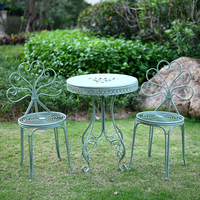 Pastoraler Eisen-Tisch mit Stühlen, Outdoor-Blumenständer, Alter Hocker, Dekorativer Balkon-Gartentisch