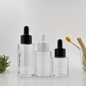 卸売オイルドロッパーボトル15ml 30ml 40ml 50mlフラットショルダーラウンドセラムガラスボトル、ドロッパーキャップとガラスピペット付き