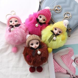 Porte-clés de poupée en peluche douce Kawaii avec nœud mignon <span class=keywords><strong>pompon</strong></span> porte-clés de bébé aux grands yeux - Product Image 1