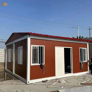 Maison modulaire préfabriquée étanche de 20 pieds en acier galvanisé avec toit à pignon et finition imitation bois, type maison de ferme ou maison conteneur - Product Image 1