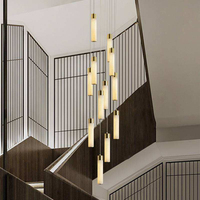 Lustre cylindrique moderne en albâtre, suspension en fer à cascade de pluie multi-lumières pour escalier, plafond haut, hôtel, villa