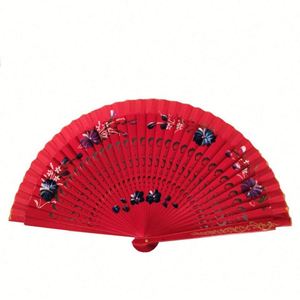 Abanico Plegable de Bambú Tallado a Mano 100% - Souvenir Ecológico para Fiestas y Decoración del Hogar - Product Image 1