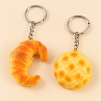 Porte-clés jouet anti-stress en PU, simulation réaliste de pain (croissant, pain ananas, baguette), à remontée lente, à presser, pour sac, cadeaux