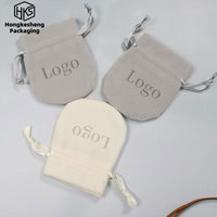 Pochette à bijoux en microfibre douce avec cordon de serrage, prix d'usine HKSOD, logo personnalisé, pour le rangement en voyage et l'emballage cadeau
