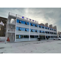 Construction de maison temporaire préfabriquée à faible coût de haute qualité Dortoir Maison modulaire détachable Immeuble de bureaux en conteneur de 3 étages