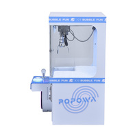 Machine à grue multicolore de haute qualité pour centre de jeux d'arcades, avec conception durable et utilisation facile pour la distribution de poupées