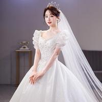 2025 usine en gros français princesse Style blanc robe de mariée principale avec lumière traînant et cristal et volants décoration